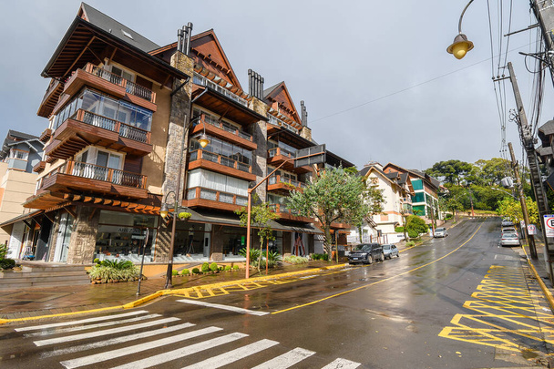 Gramado, RS, Brazil - May 17, 2022: street and buildings on city downtown, architecture of Gramado. - Fotó, kép