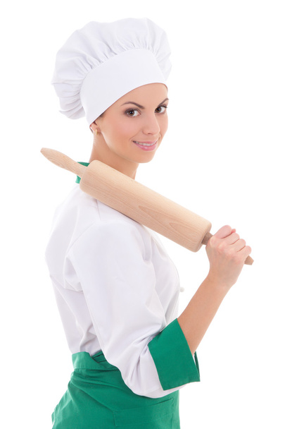 jeune femme en chef uniforme avec isola de rouleau à pâtisserie allant au four en bois - Photo, image
