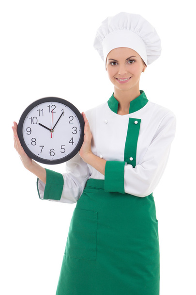 young attractive woman in chef uniform with office clock isolate - Valokuva, kuva