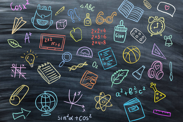 Many different drawings on school blackboard - Foto, Bild