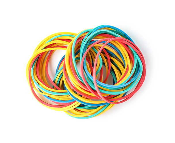 Many colorful rubber bands on white background - Foto, afbeelding