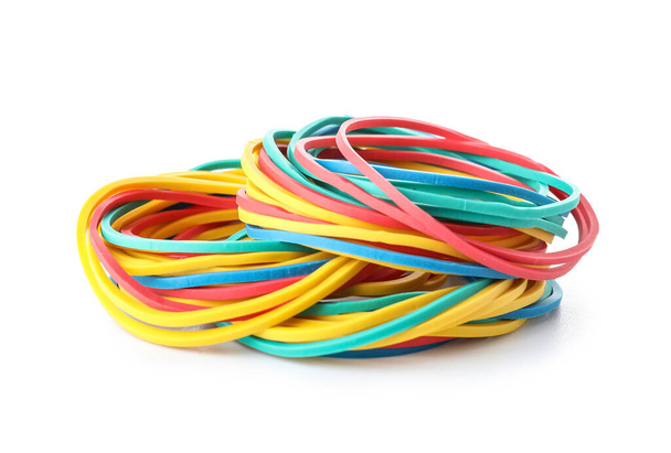 Many colorful rubber bands on white background - Photo, image