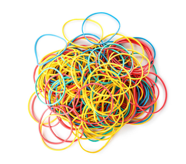Heap of elastic rubber bands on white background - Zdjęcie, obraz