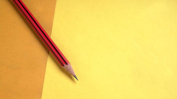 Pencil on bright background, closeup - Foto, afbeelding