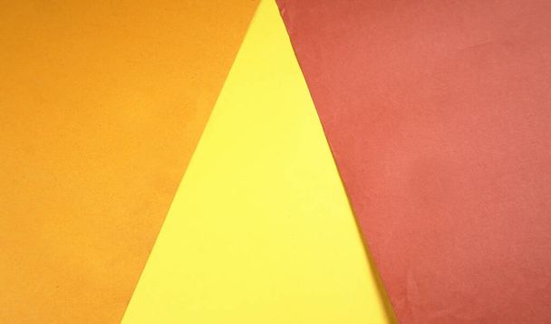 Colorful paper background. Concept of primary colors. Angle and diagonal lines. Top view flat lay with copy space. - Fotoğraf, Görsel