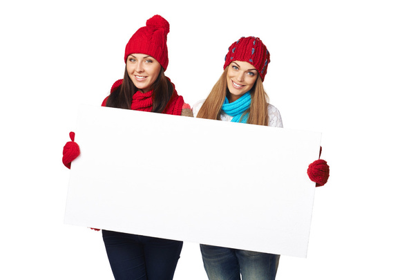 Two winter females with banner - Фото, изображение