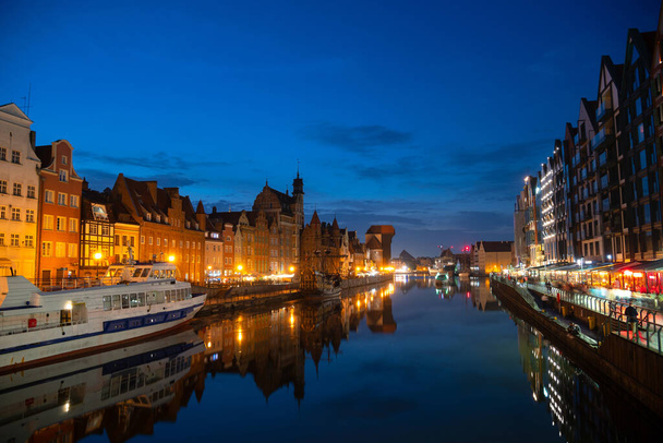 Scenic summer evening panorama of the architectural embankment pier canal river illumination of the Old Town GDANSK, POLAND - Photo, Image