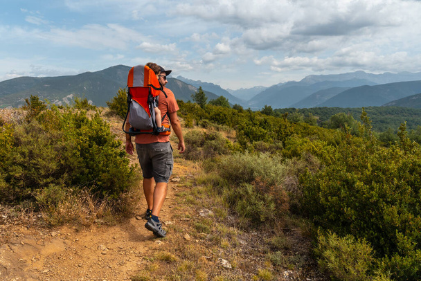 A man on a trek between the villages of Las Latas to Larrede near Sabianigo, Pyrenees Aragn - Fotó, kép