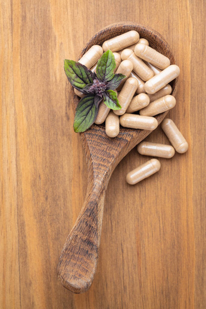 Alternative Medicine. Herbal capsule, Nutritional Supplement. - Photo, image