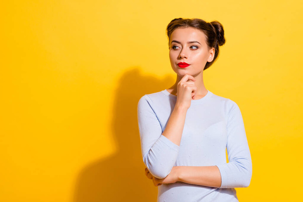 Photo of young smart business lady look blank space consider new project startup ideas isolated on yellow color background. - Photo, Image