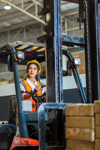 worker with forklift in warehouse - Photo, Image