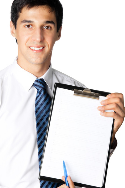 Businessman showing clipboard, isolated  - Фото, изображение