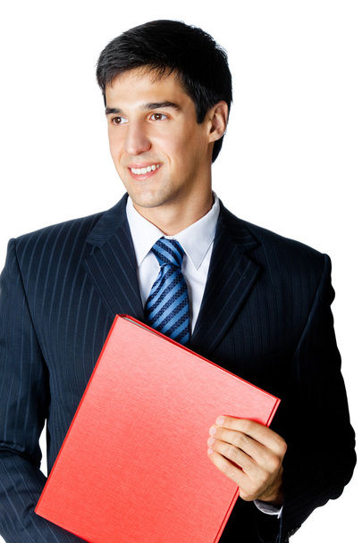 Smiling businessman with red folder, isolated on white - Фото, изображение