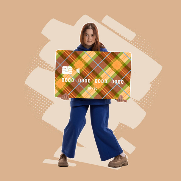 Contemporary art collage. Modern design with young woman holding plastic credit card isolated on beige background. Concept of economy, banking, money, payment, shopping, finance. Copy space for ad - Foto, Bild