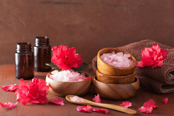 spa aromatherapy with azalea flowers and herbal salt on rustic d - Foto, Imagen