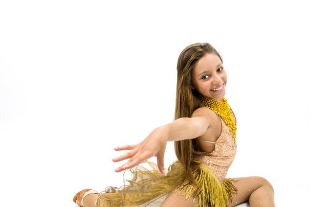 Teenger smiling in golden dress - Фото, зображення