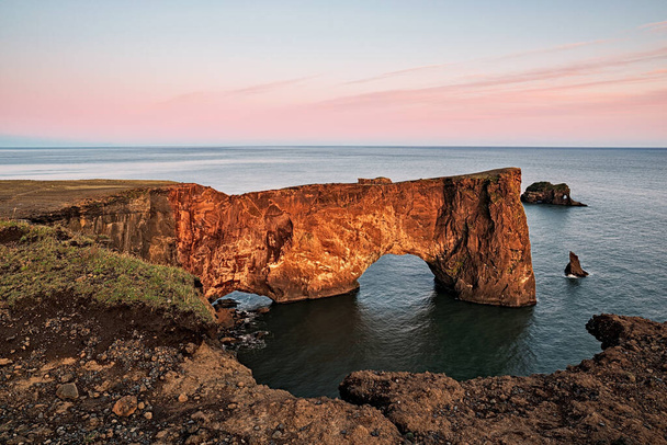 Dyrholaey rock formation at sunset not far from the village of Vik, Iceland - Foto, immagini