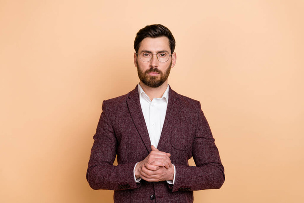 Photo of young handsome reliable human resources manager have interview with new employee isolated on beige color background. - Fotoğraf, Görsel
