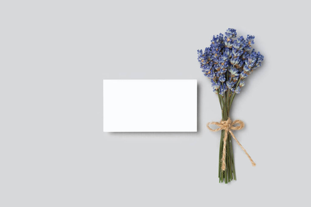 Mockup two cutaway, discount, business card on a grey minimalism background and lavender flowers with copy space. Template for design - Zdjęcie, obraz
