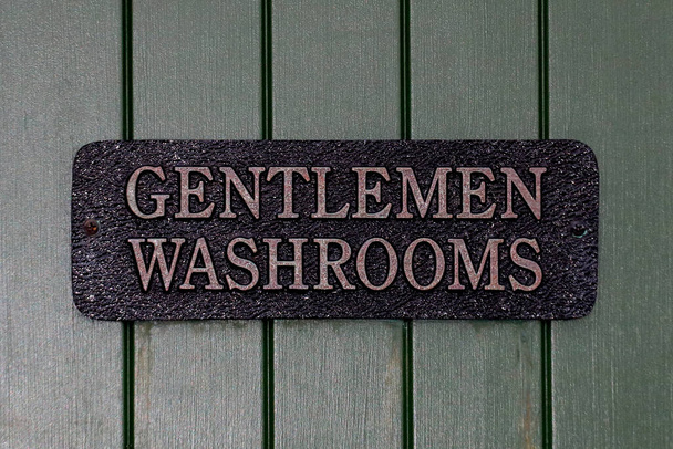 Gentlemens washrooms door sign at a golf club - Valokuva, kuva