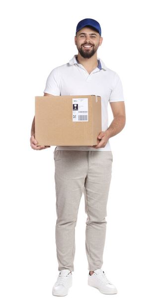 Courier holding cardboard box on white background - Foto, afbeelding