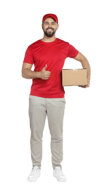 Courier holding cardboard box on white background - Foto, afbeelding