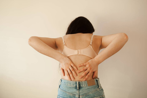 Kidney infection pyelonephritis urinary tract infection. Attractive woman feel backache spine pain because of UTI pyelonephritis disease - Photo, Image