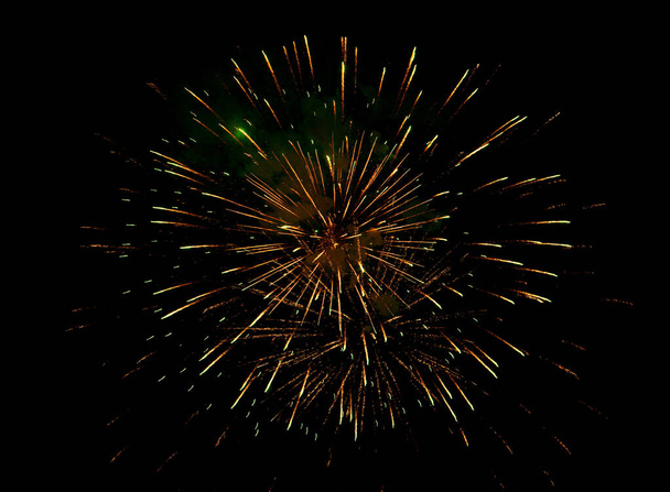 Beautiful bright fireworks lighting up night sky - Zdjęcie, obraz
