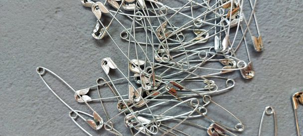 Pins for modern sewing and dissemination of materials for industry - Foto, imagen