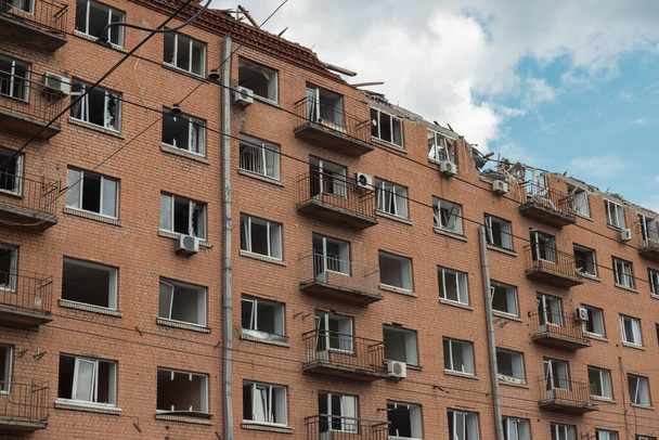 War of Russia against Ukraine. A residential building damaged by an russian cruise missiles in the Ukrainian capital Kyiv - Fotografie, Obrázek
