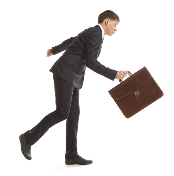 Businessman running with a briefcase - Zdjęcie, obraz