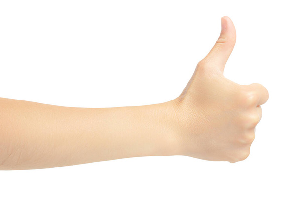 Thumbs up. Human hand shows a thumb signal. High quality photo - Foto, afbeelding