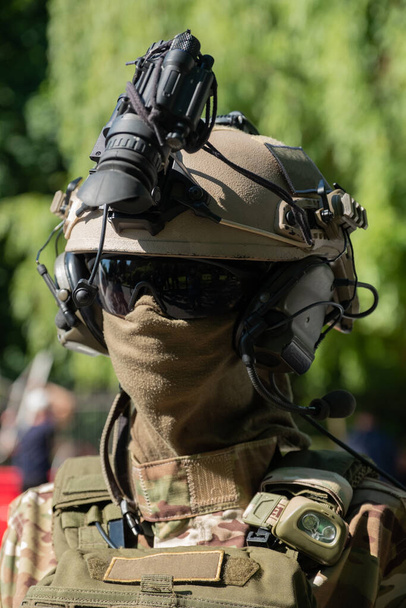 Mannequin in army uniform and equipment. Safety helmet and goggles. - 写真・画像