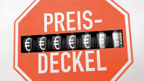 Sähkömittari, jossa on saksalainen varoitusmerkki "Preisdeckel" (hintakatto) - Valokuva, kuva