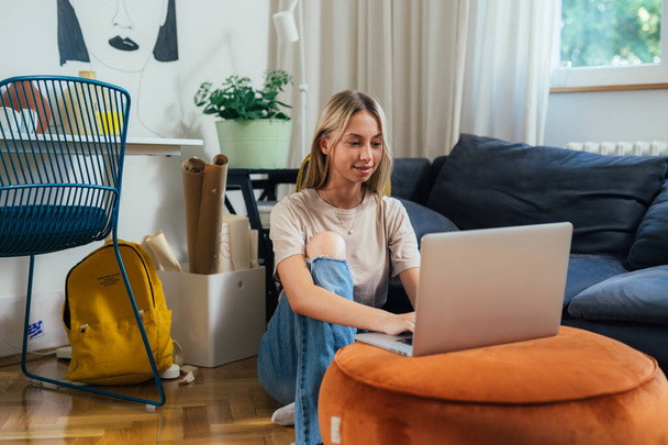 teenager girl using laptop computer at home - Photo, Image