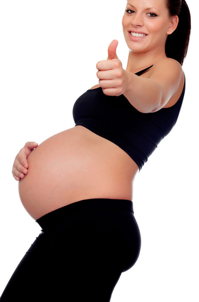Brunette pregnant woman saying Ok  - Foto, imagen