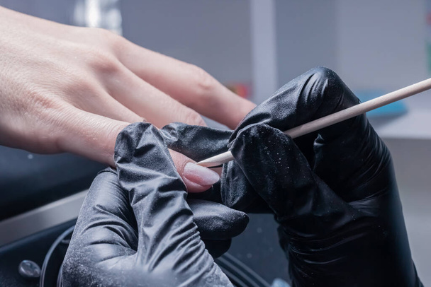 The process of manicure in a beauty salon close-up - Zdjęcie, obraz