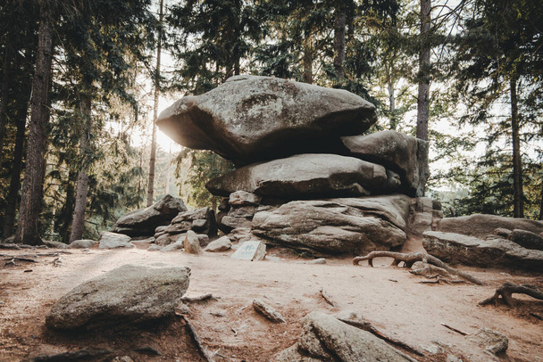 Chybotek, balancing rock in Szklarska Poreba, Sudeten mountains, Poland. - 写真・画像