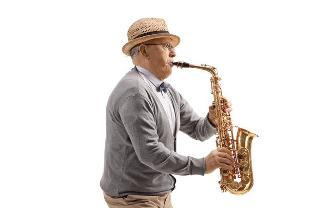 Senior man saxophone player isolated on white background - Фото, изображение