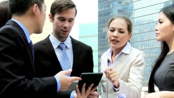 Business colleagues meeting outside office building - Footage, Video