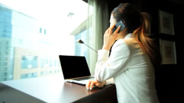 Businesswoman working in hotel apartment - 映像、動画