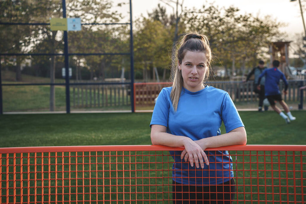 female soccer player on a soccer field. Rights of women soccer player. High quality photo - Φωτογραφία, εικόνα