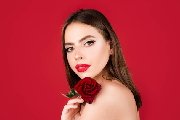 Portrait of attractive woman beauty girl with red rose - Фото, зображення