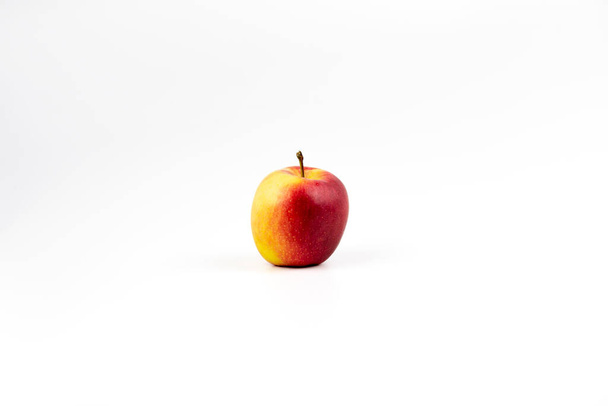 Red apple with half isolated on white background with clipping path and full depth of field. View from above. - Foto, Bild