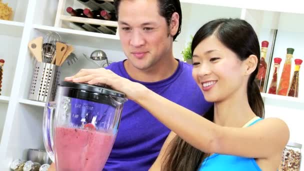 Couple preparing fresh juice drink - Footage, Video