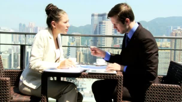 Business associates in rooftop restaurant - Footage, Video