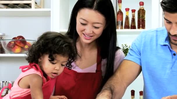 Couple with daughter baking cookies - Footage, Video