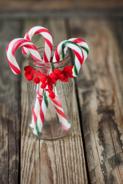 christmas sweet candy in the glass on the background, vertical - Φωτογραφία, εικόνα