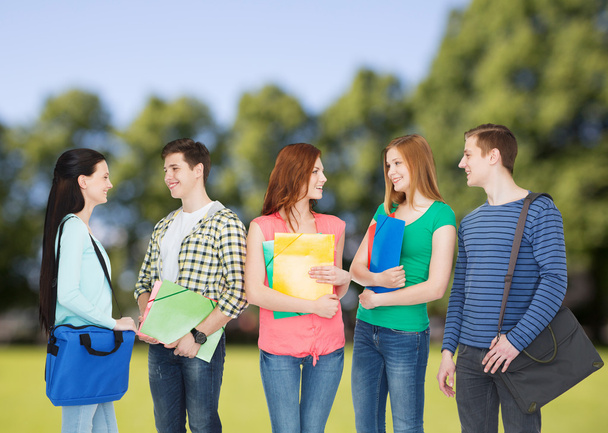 group of smiling students standing - Foto, Imagen