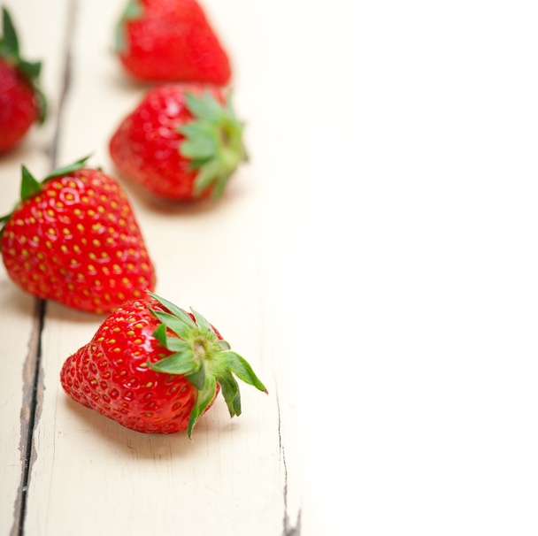 fresh organic strawberry over white wood - Photo, Image